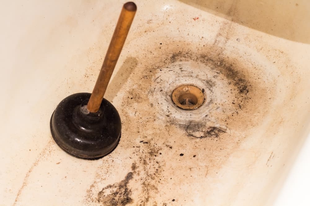 How to unblock a clogged bath or shower